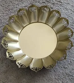 Gold metal lotus urli with intricate punched lotus design for home decor